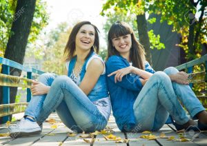 13785999-Girls-laughing-happilly-Stock-Photo-friends-jeans
